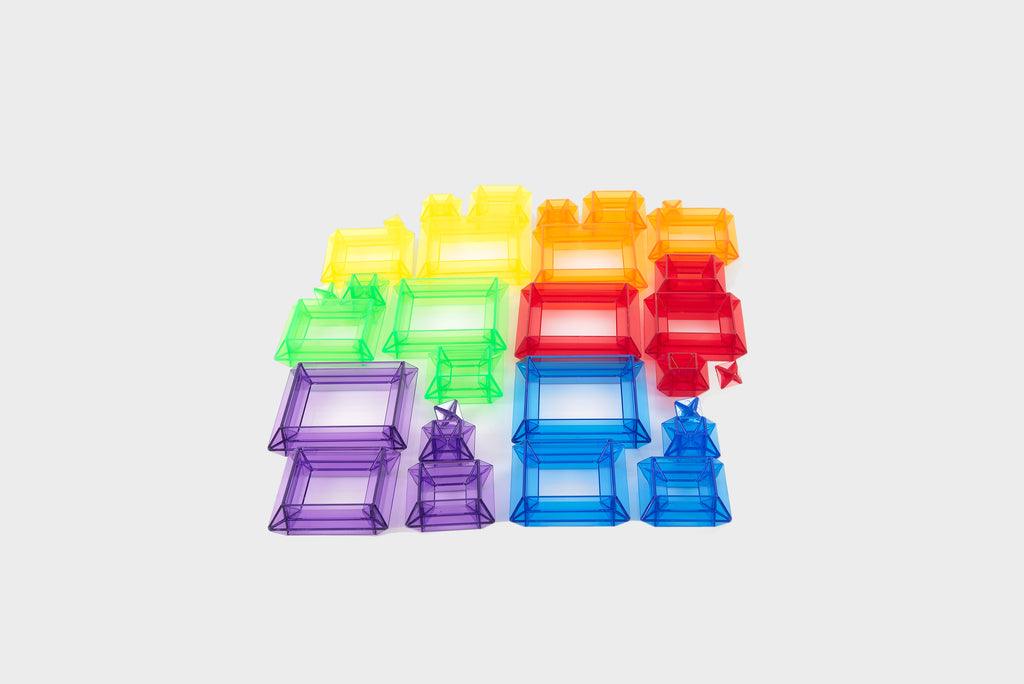 Translucent pyramid builder set with grouped rainbow stackable pyramid blocks