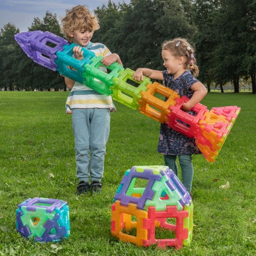 Translucent giant polydron building set with colorful interlocking plastic pieces, cube pieces