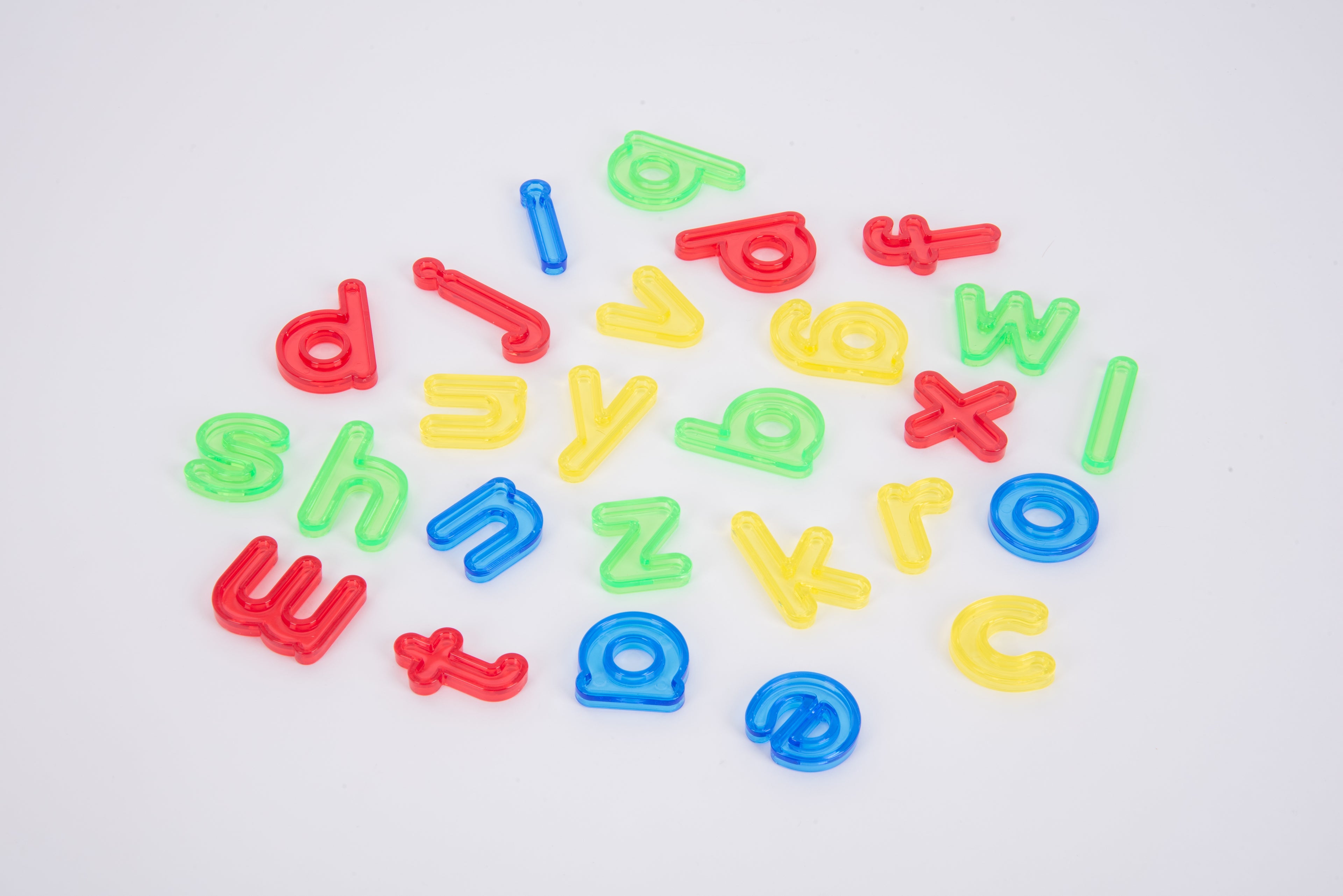 Translucent lowercase letters, assorted multicolor plastic shapes
