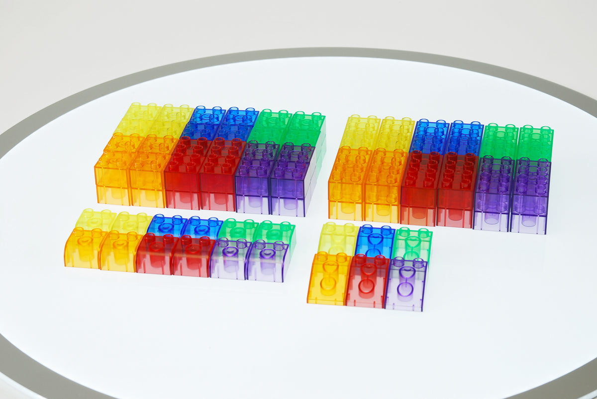 Assorted translucent multicolor module blocks, interlocking clear pieces