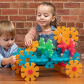 Translucent Octoplay My First class set with colorful interlocking gear pieces, child playing