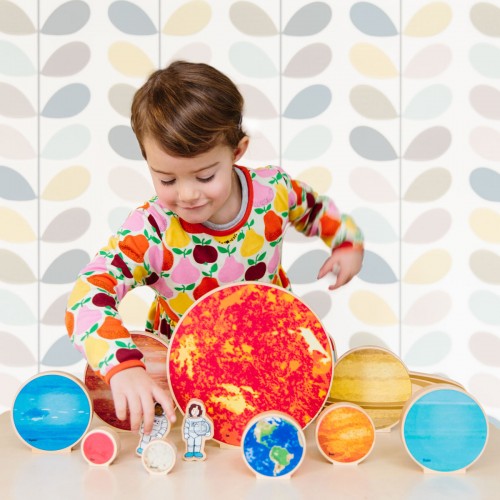 Colorful space-themed toy set with planets and rocket for kids