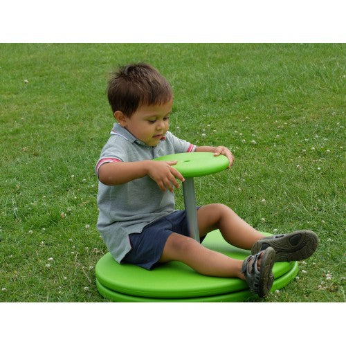 Green sit-on spinning toy with round base and grip handle
