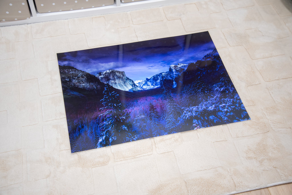 Winter Valley play mat featuring snowy mountains and blue night sky design