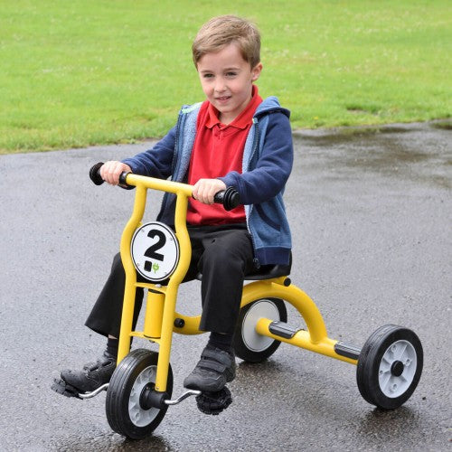 Yellow kids tricycle with front number plate and training wheels