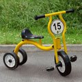 Yellow narrow-axle tricycle with black seat and three small wheels, number 15 plate