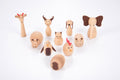 Wooden animal figurines with various ears, tails, and animal faces