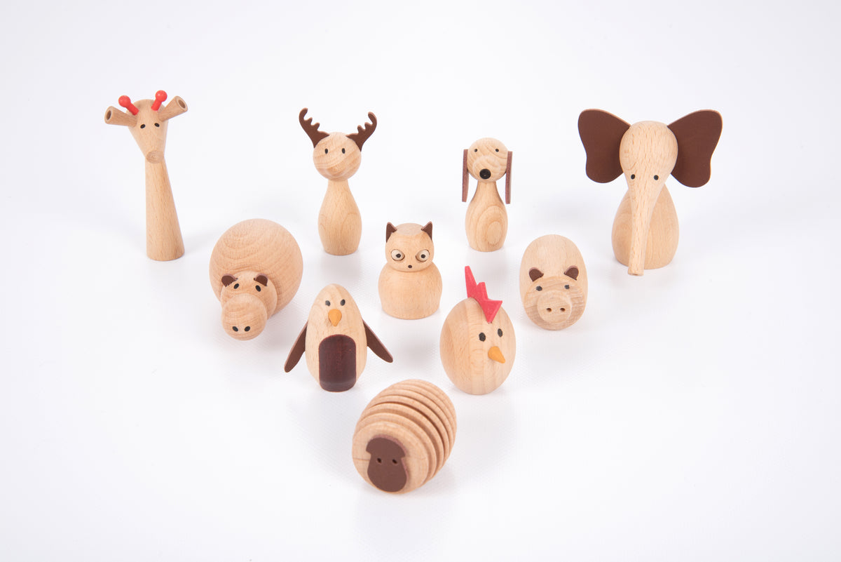 Wooden animal figurines with various ears, tails, and animal faces