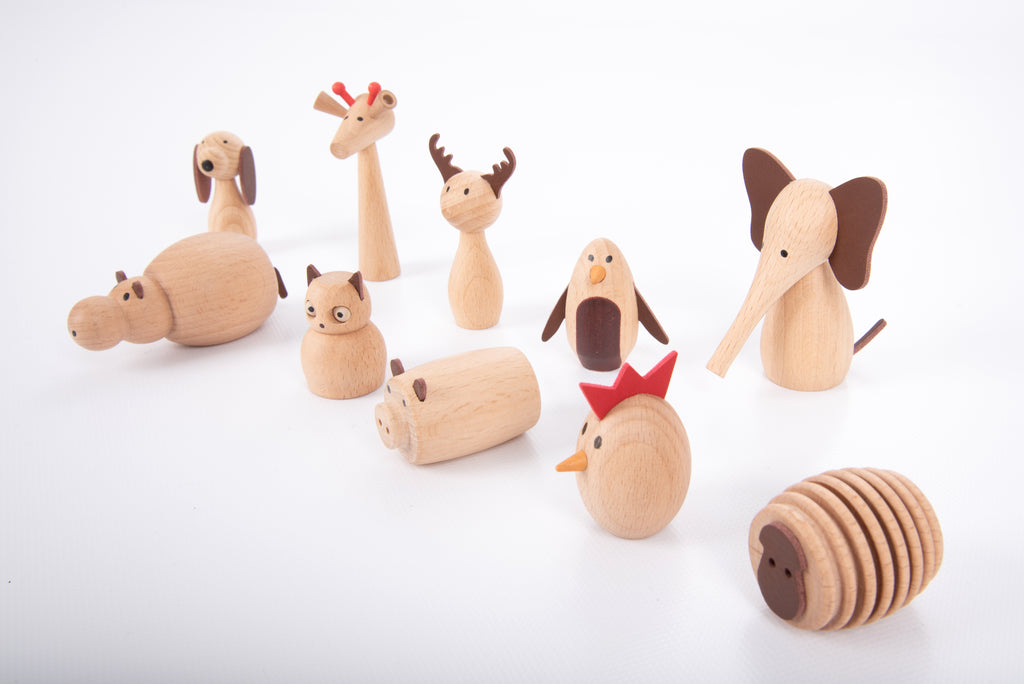 Wooden animal figurines with red accents, mixed animal faces