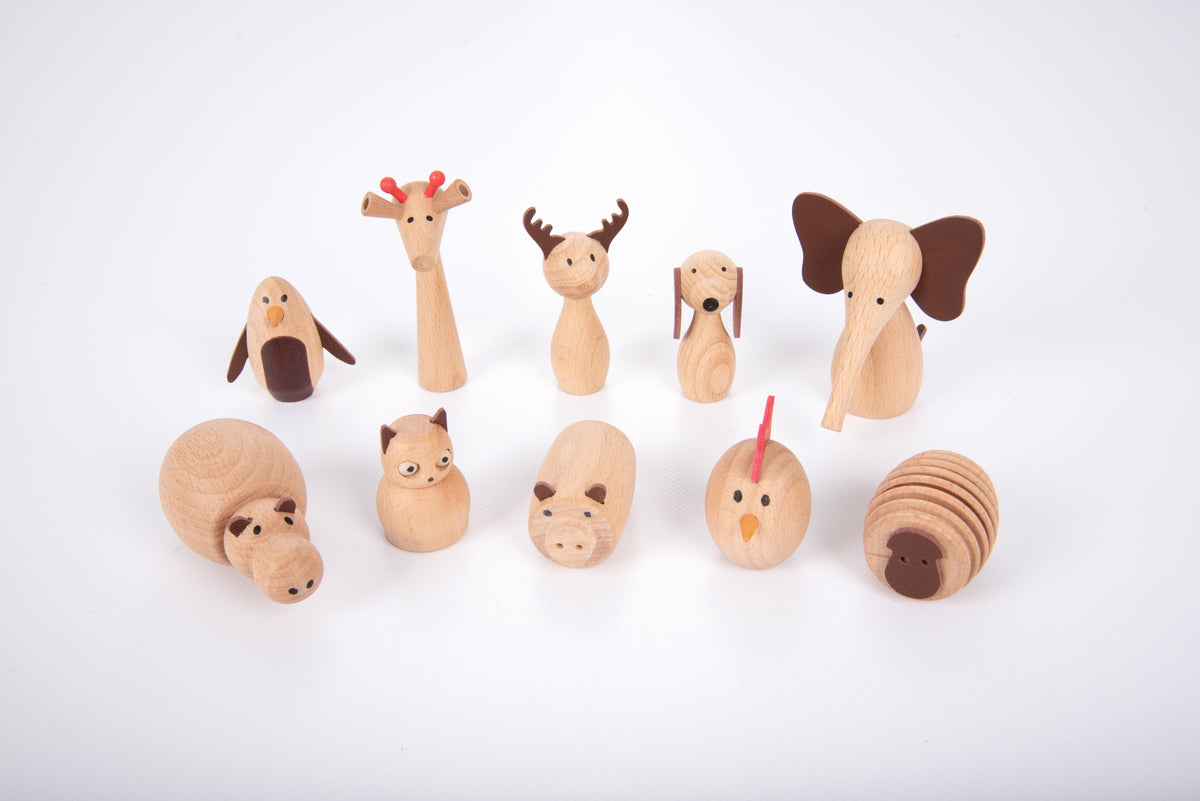 Assorted wooden animal figurines, featuring giraffe and bunny shapes