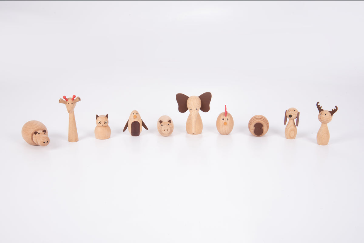 Set of small wooden animal figurines, assorted animal shapes