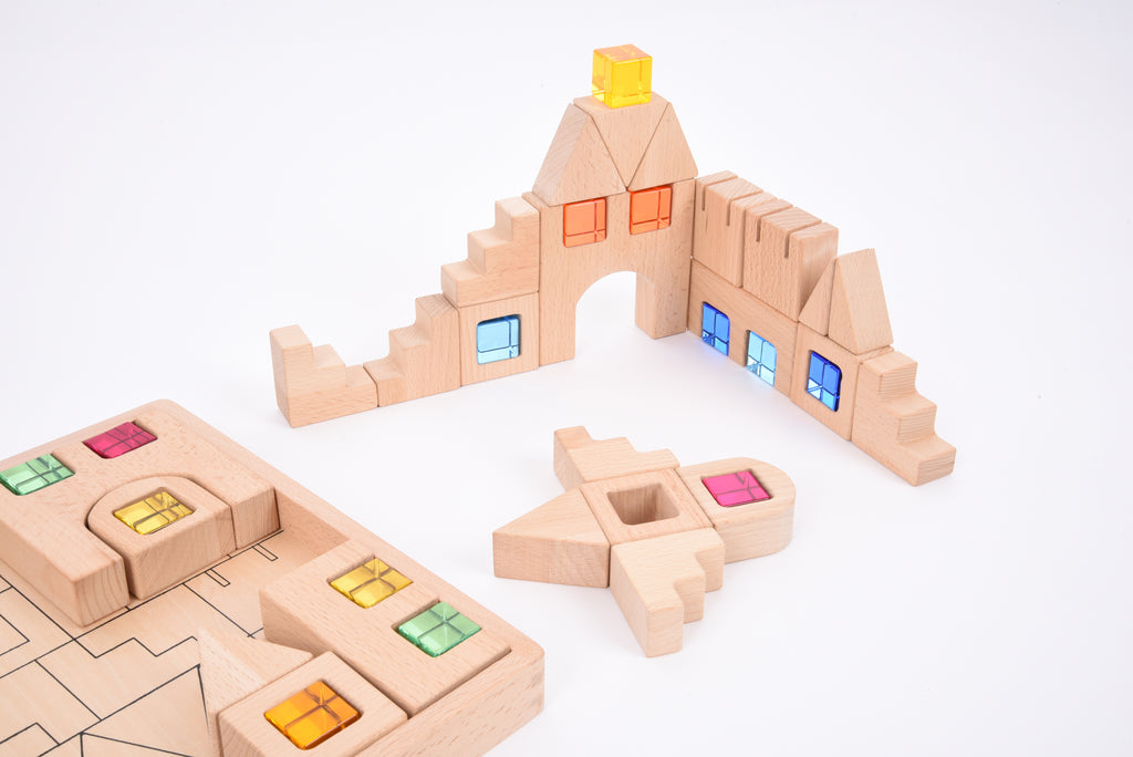 Wooden gem building block set close-up of house walls, door openings, and colored lights