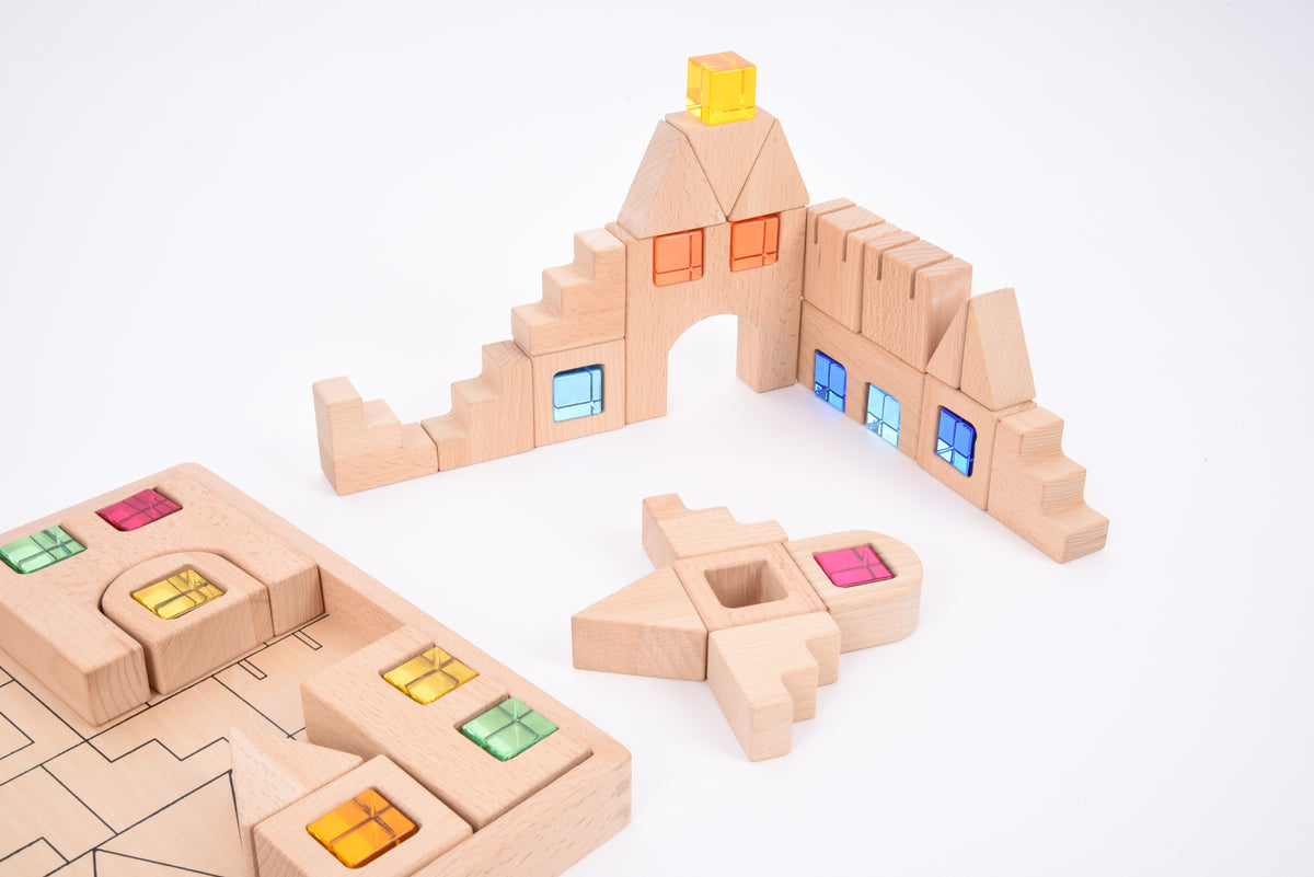 Wooden gem building block set close-up of house walls, door openings, and colored lights