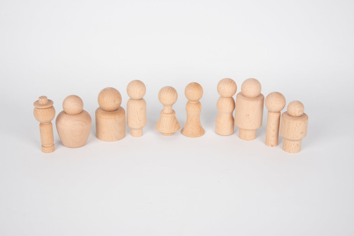 Wooden peg-style community figures, long lineup of light wood human shapes