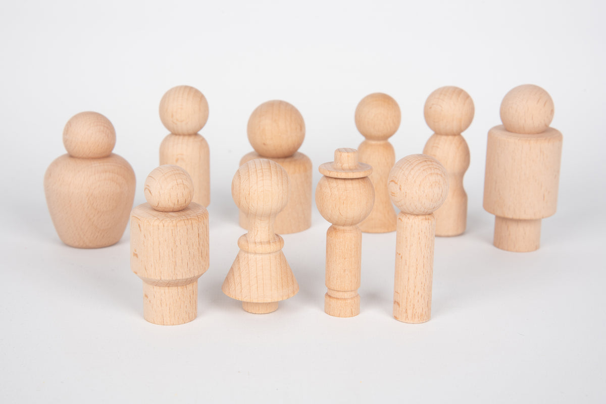 Wooden human figures, front view of assorted standing pieces with rounded heads