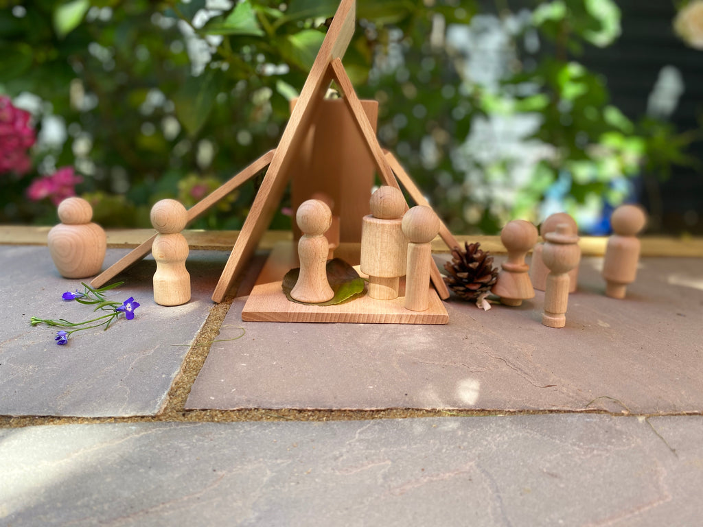 Wooden community figure set with small people pieces and triangular display stand
