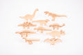 Wooden dinosaur blocks set with engraved ribs and backs, light wood pieces