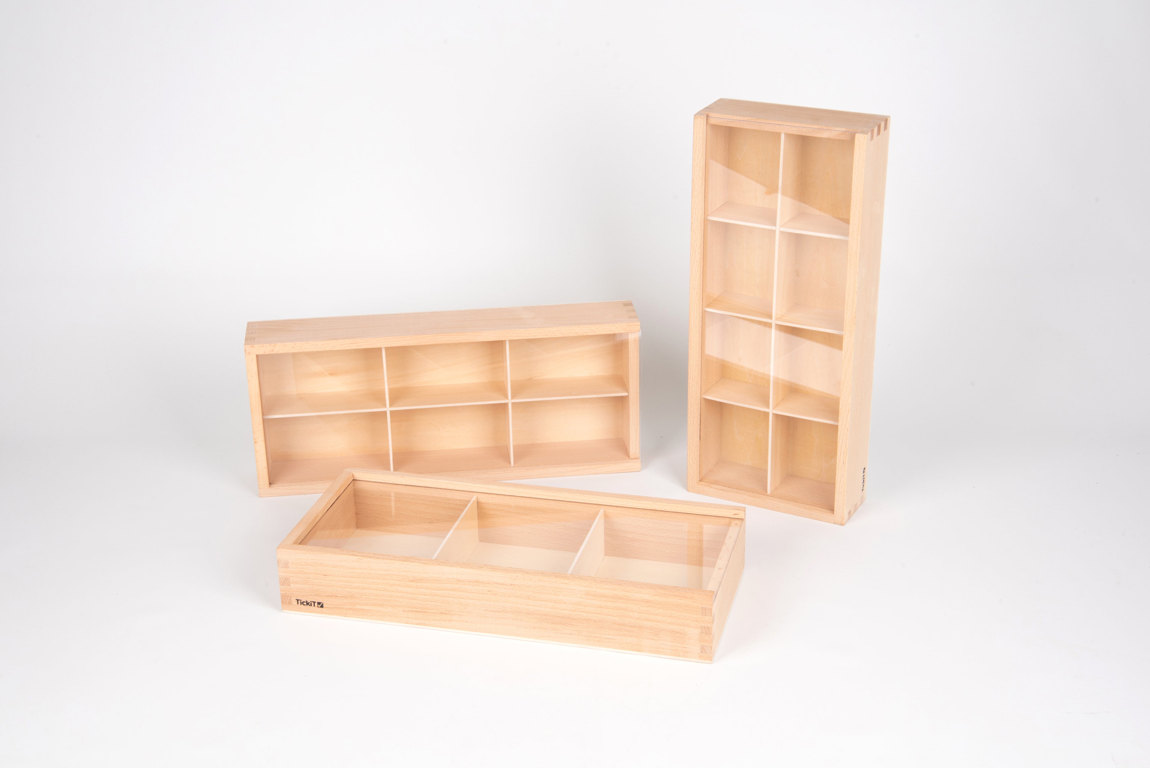 Wooden discovery box set with lids open: long tray and two shelving cabinets