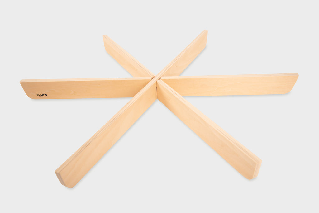 Light wood wooden dividers forming a cross for sorting play pieces