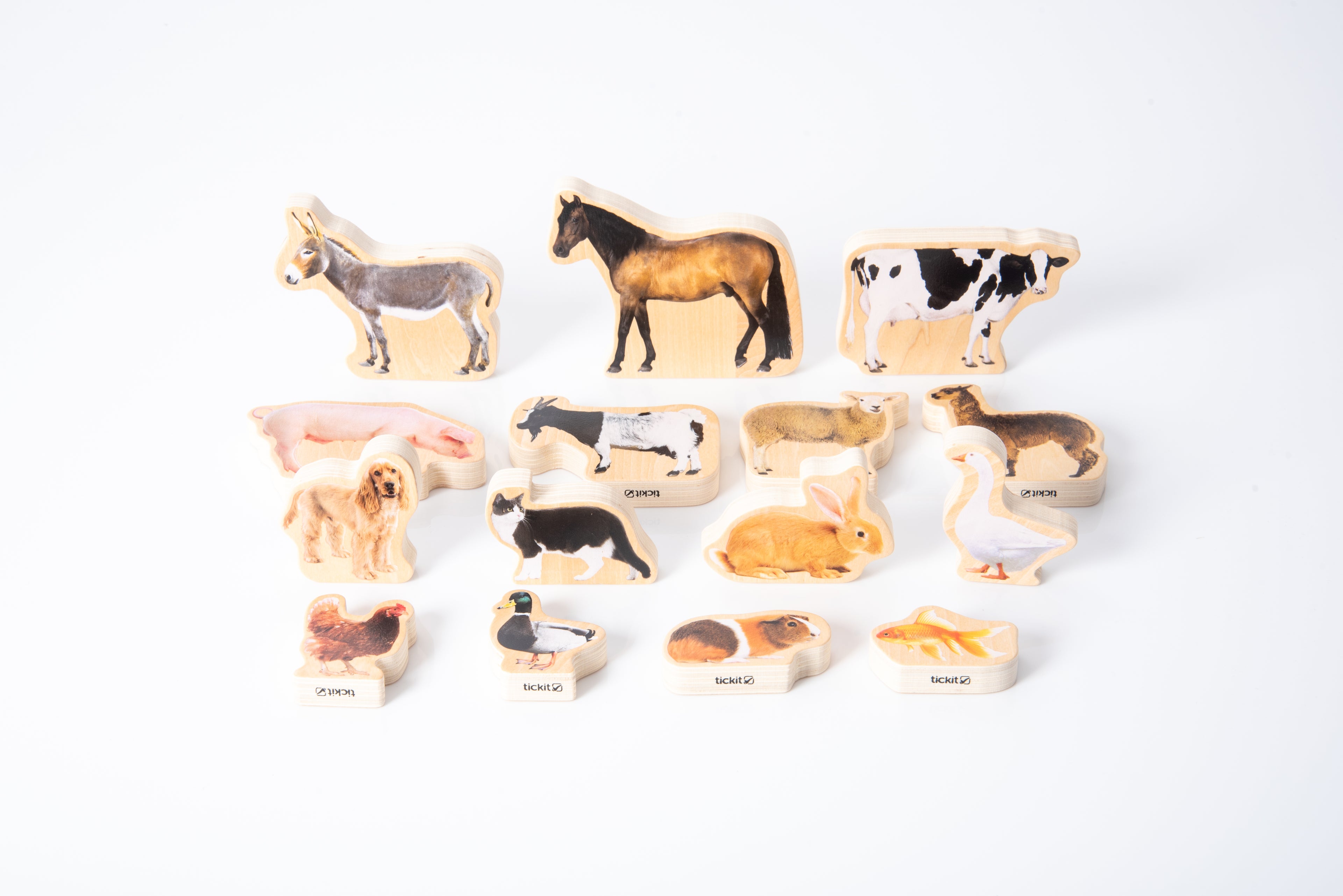 Wooden domestic animal blocks with cow, dog, and other animal figures