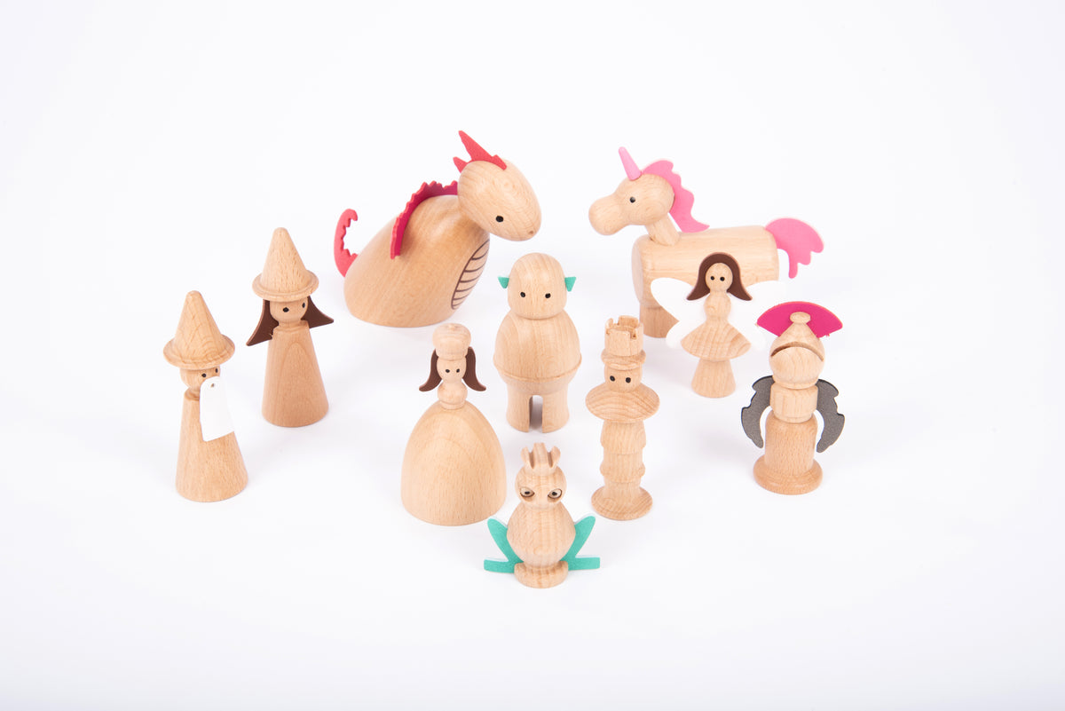 Wooden enchanted figure set with assorted animal and person characters in light wood