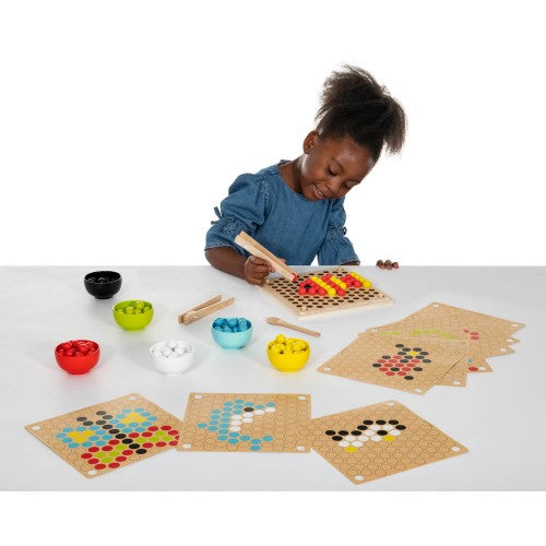 Wooden pattern balls and perforated placement boards set for fine motor play