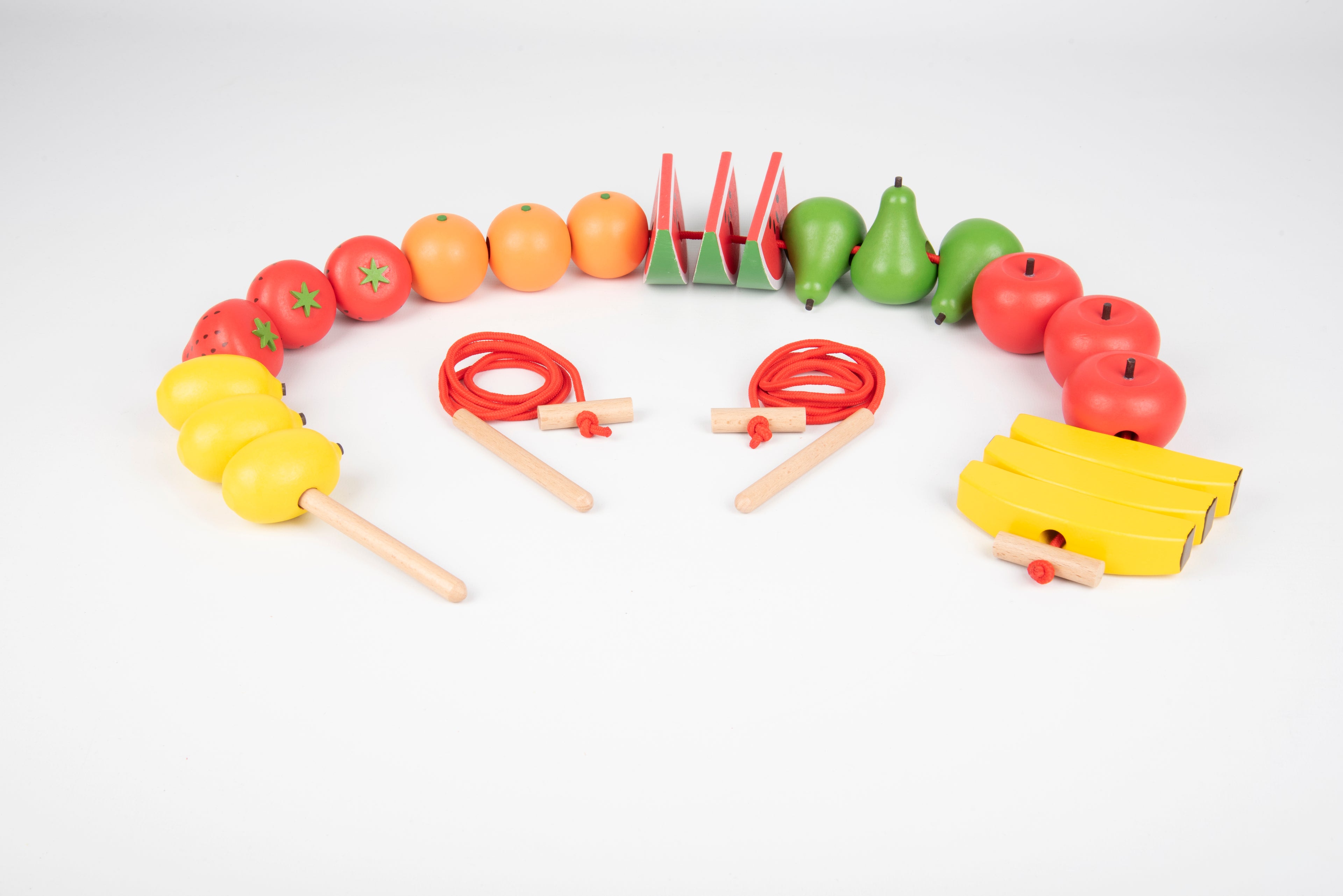 Wooden lacing fruit toy set with red cords, sticks, and shaped fruit beads