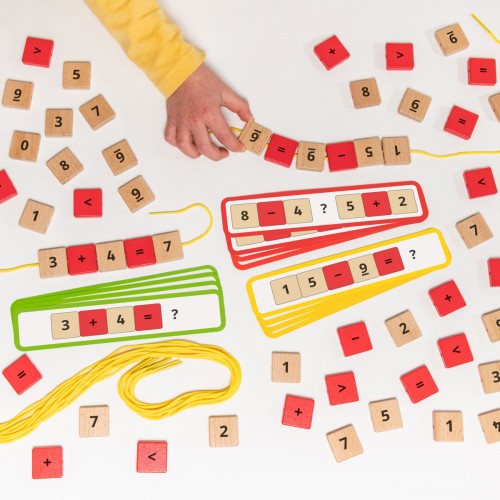 Wooden number bead lacing set with numbered tiles and colorful laces