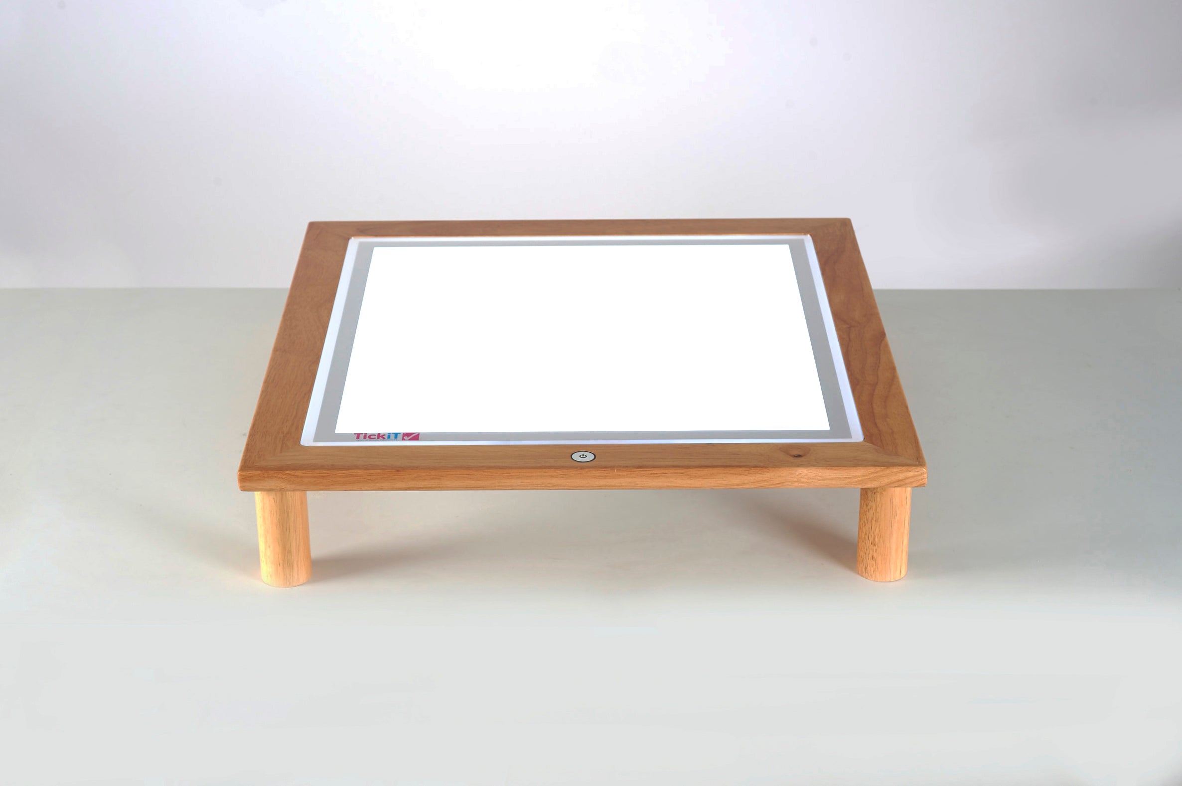 Wooden light table with recessed rectangular light screen in wooden frame, four legs