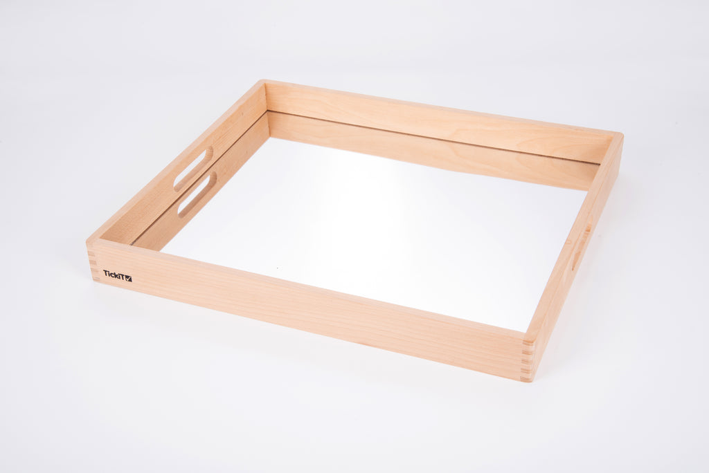 Wooden mirror tray with light wood frame and empty reflective insert, top view