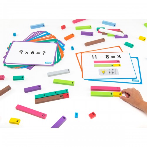Colorful wooden number rods with printed digits, shown on a math board; hand holding one