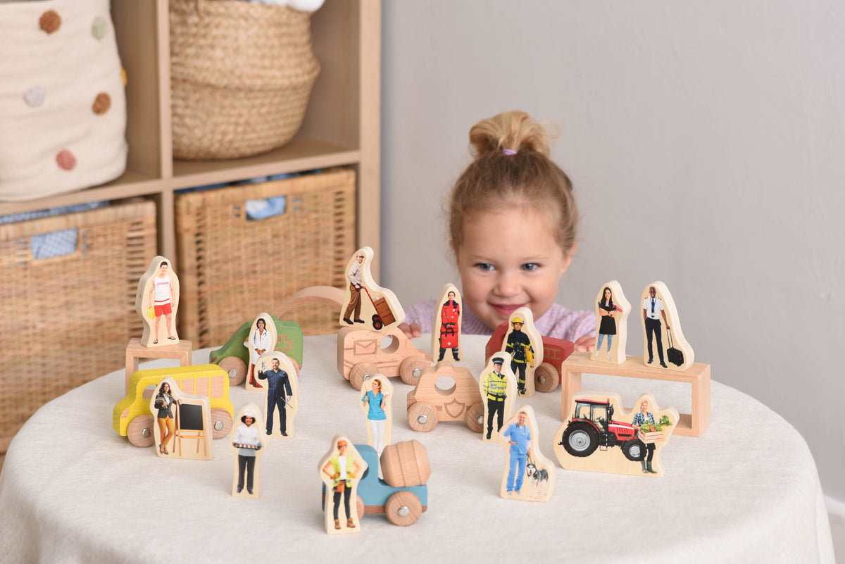 Wooden people figurines and vehicles blocks, with multiple standing character cutouts