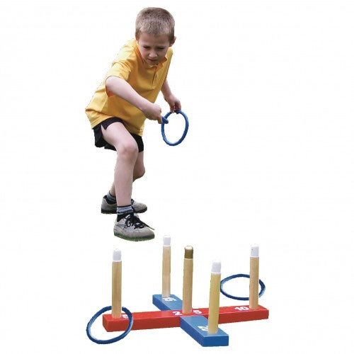 Wooden quoit game set with four posts and blue rings on red bases