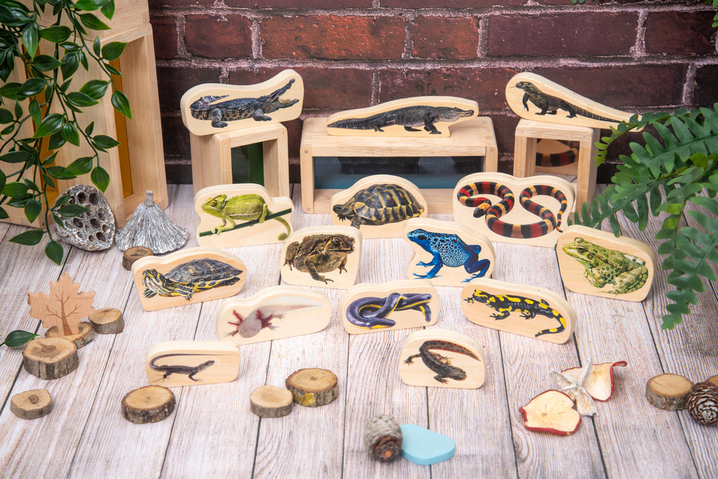 Wooden reptile and amphibian animal blocks with stacked wooden trays and pegs
