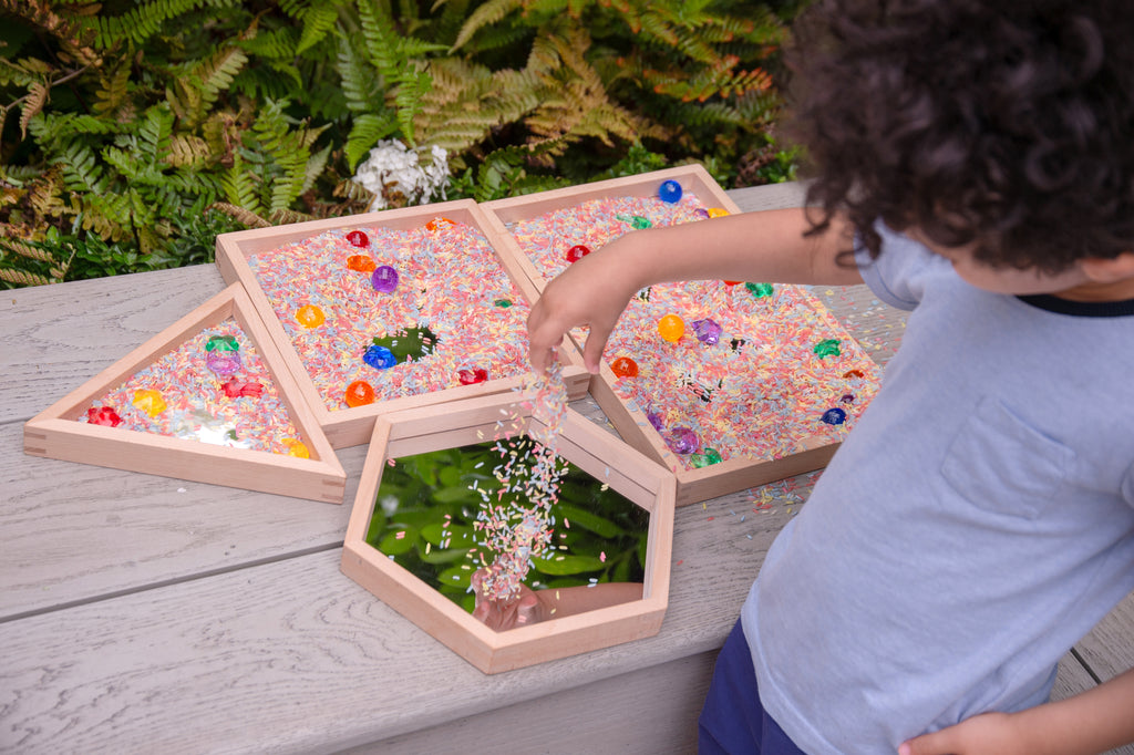 Wooden mirror tray set of 4 with light wood frames and clear mirrors, green leaf pieces inside