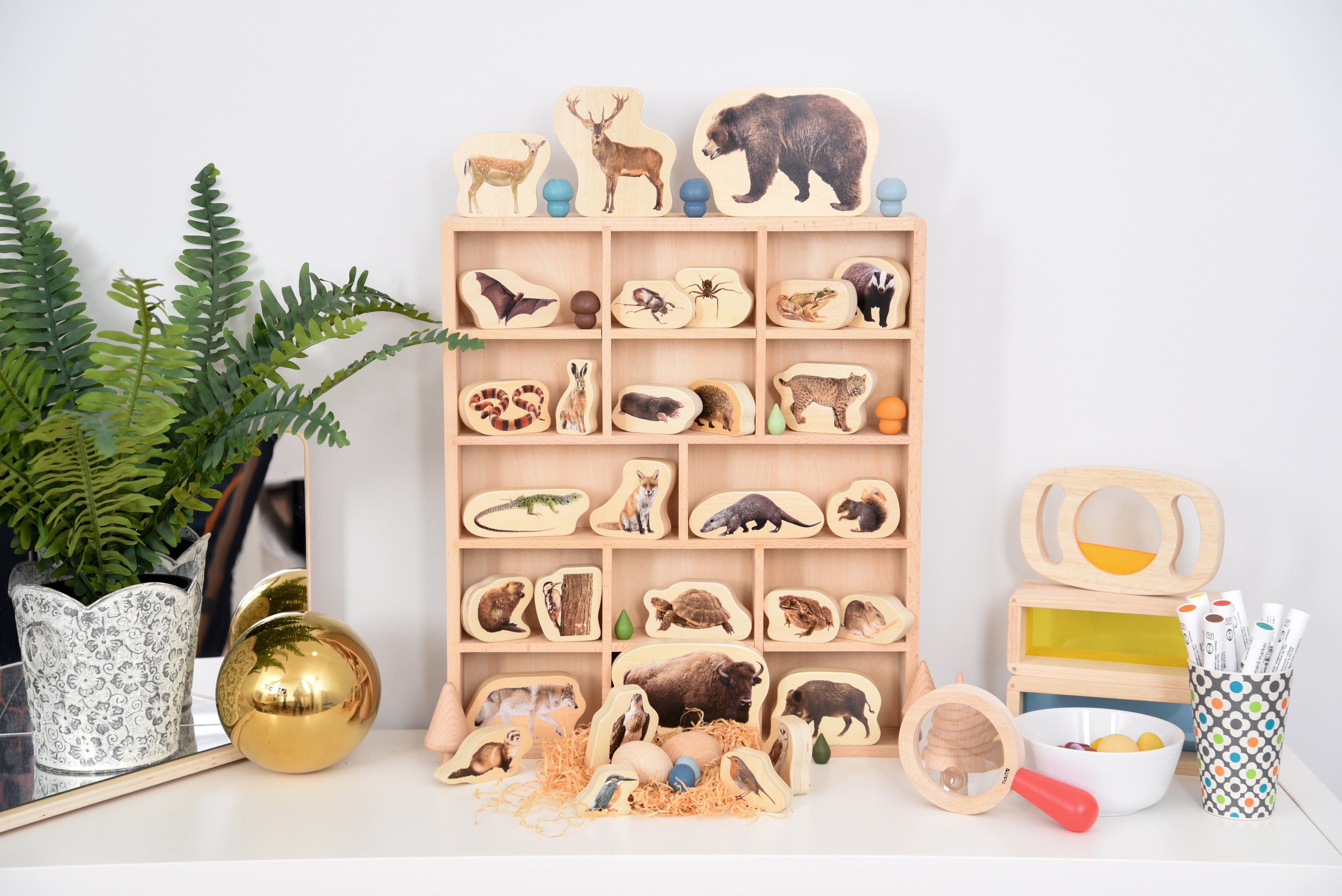 Wooden 14-slot sorting tray with open compartments and animal toy set