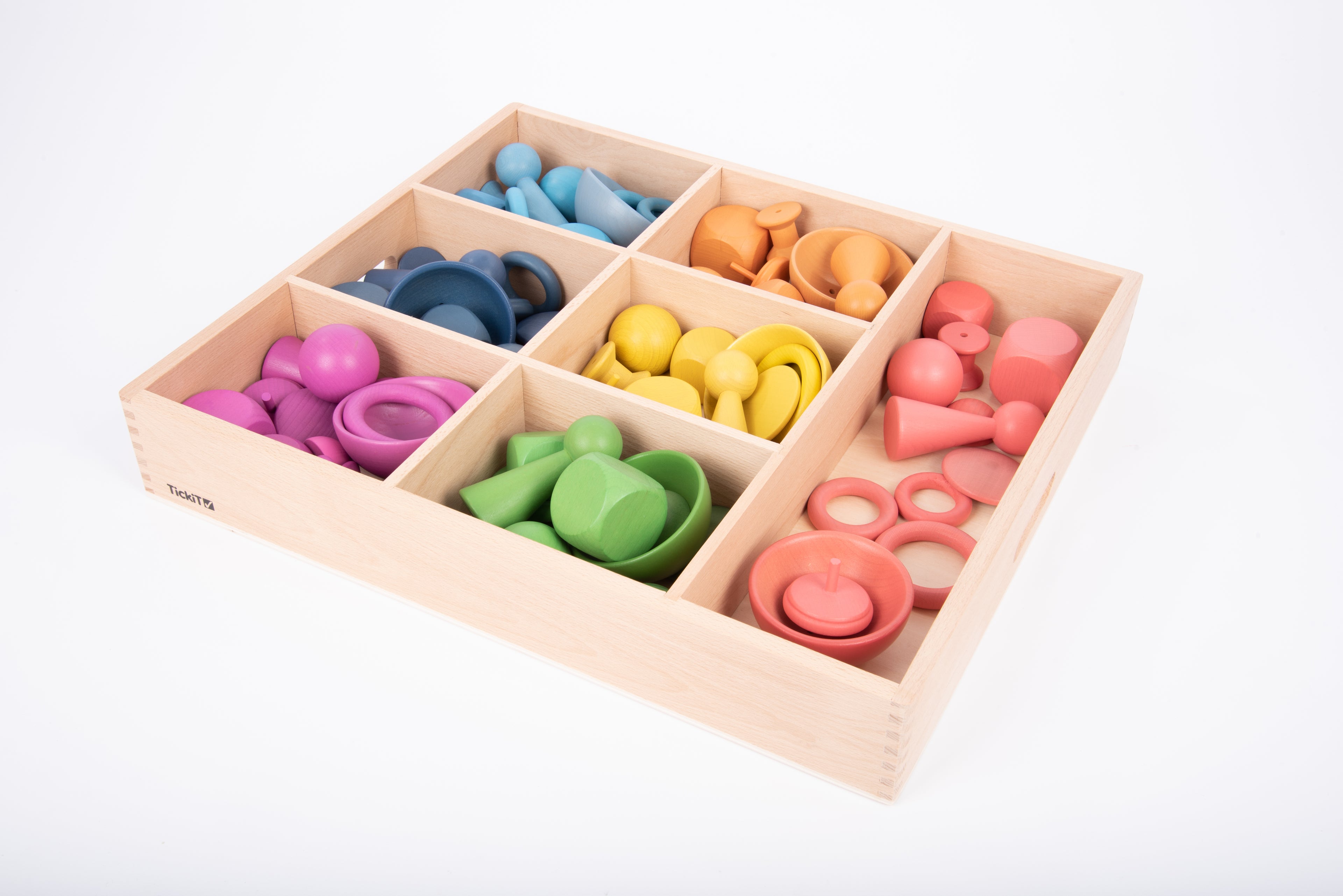 Wooden sorting tray with 7 compartments, filled with pastel building blocks