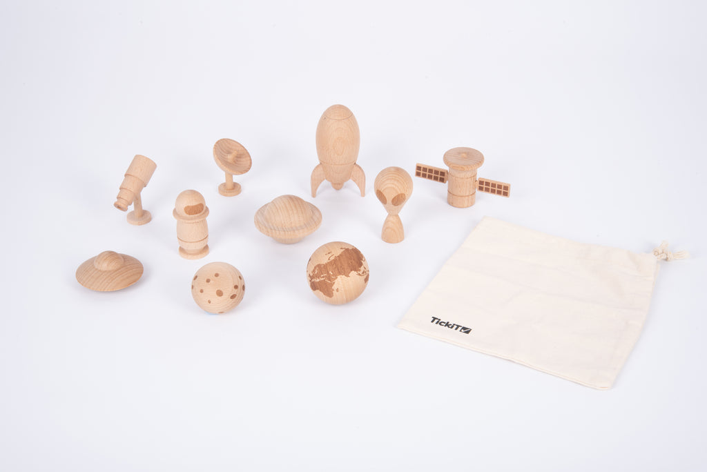 Wooden space play set with astronaut, planet pieces, rocket, rover, and storage bag