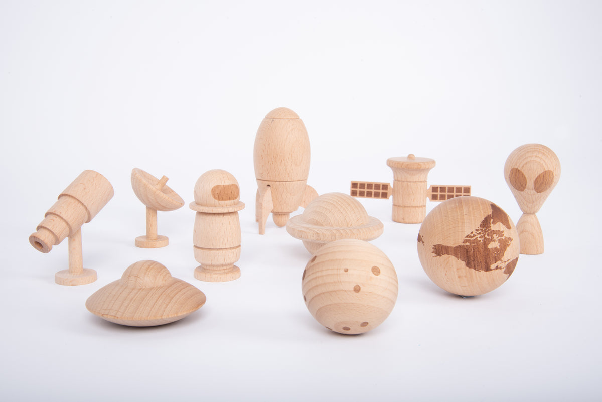 Wooden space play set with planet sphere, astronaut figure, rover and rocket accessories