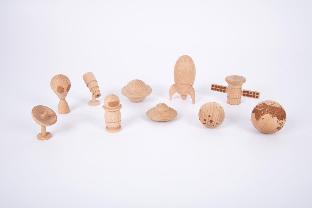 Wooden space play set with astronaut, planet and planet ring pieces, rocket and rover