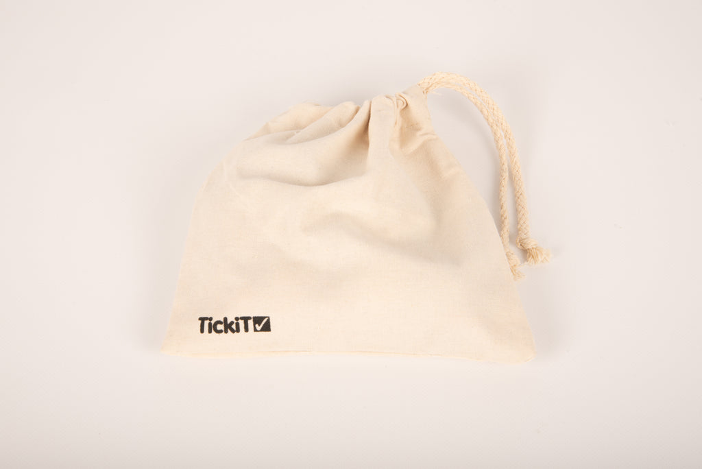Cream cotton drawstring pouch with TickiT logo, closed top