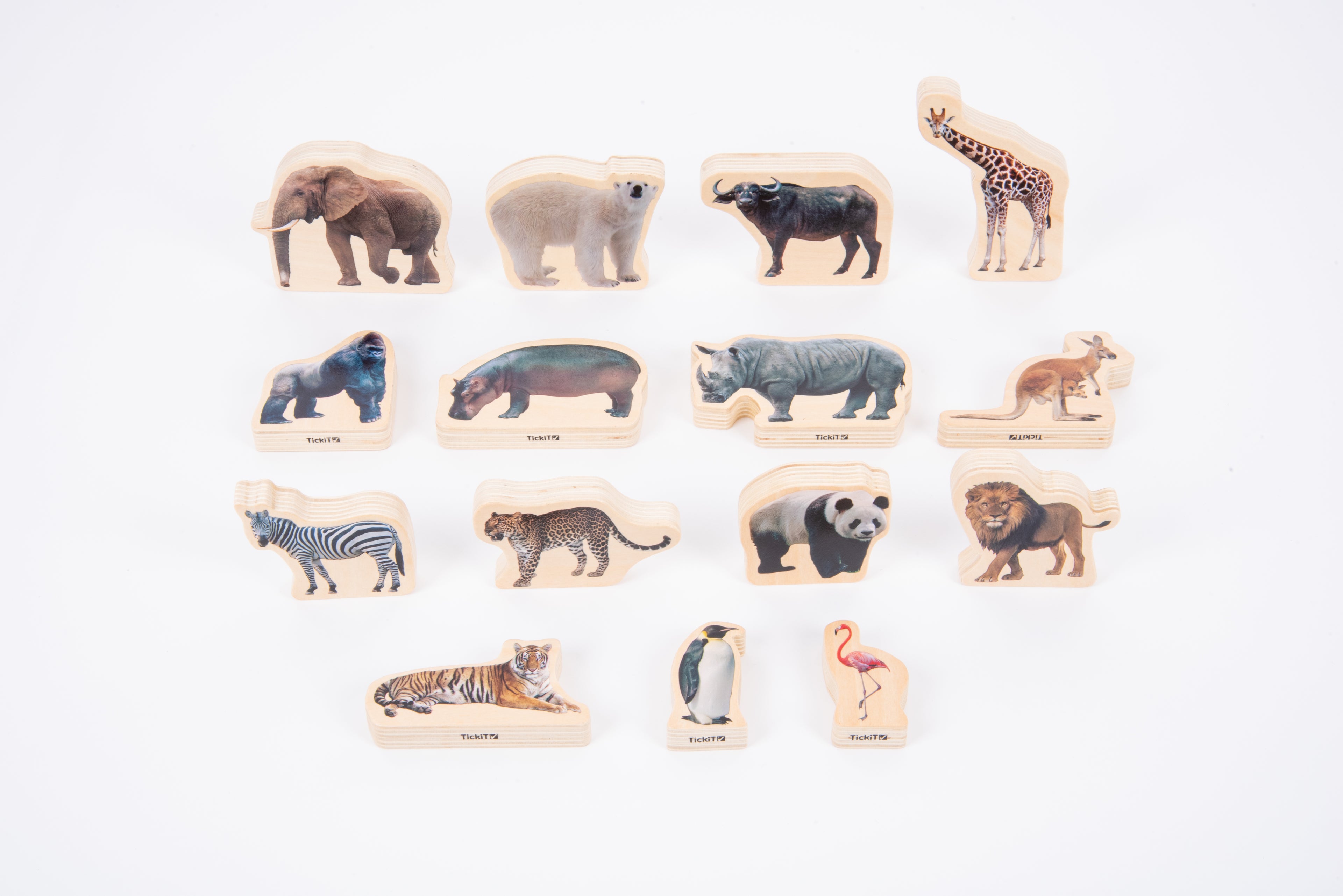 Wooden wild animal blocks laid out on a white background, featuring assorted animals