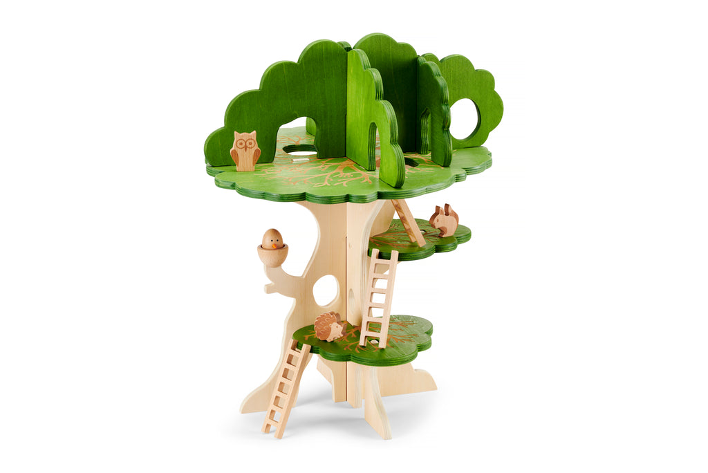 Wooden treehouse playset with green leaf canopy and ladder steps
