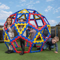 Multi-color interlocking Geo Dome play structure, rounded dome with open windows