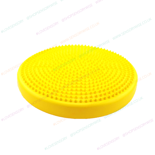 Gymnic balance wobble cushion with yellow studded surface