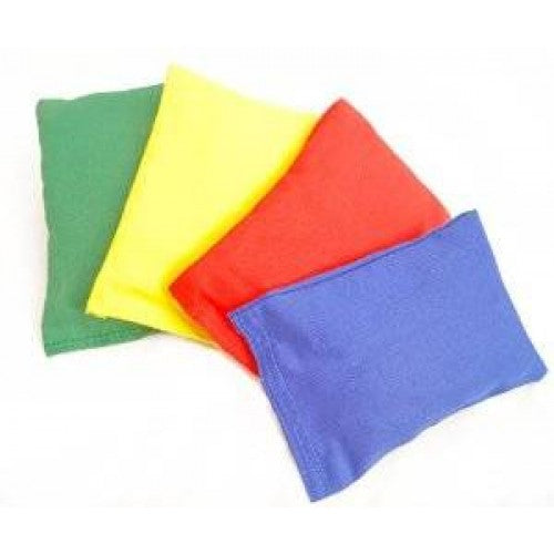 Four rectangular fabric bean bags in green, yellow, red, and blue.