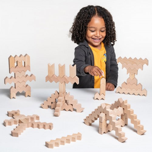 Wooden zigzag blocks set with interlocking T-shaped pieces for building
